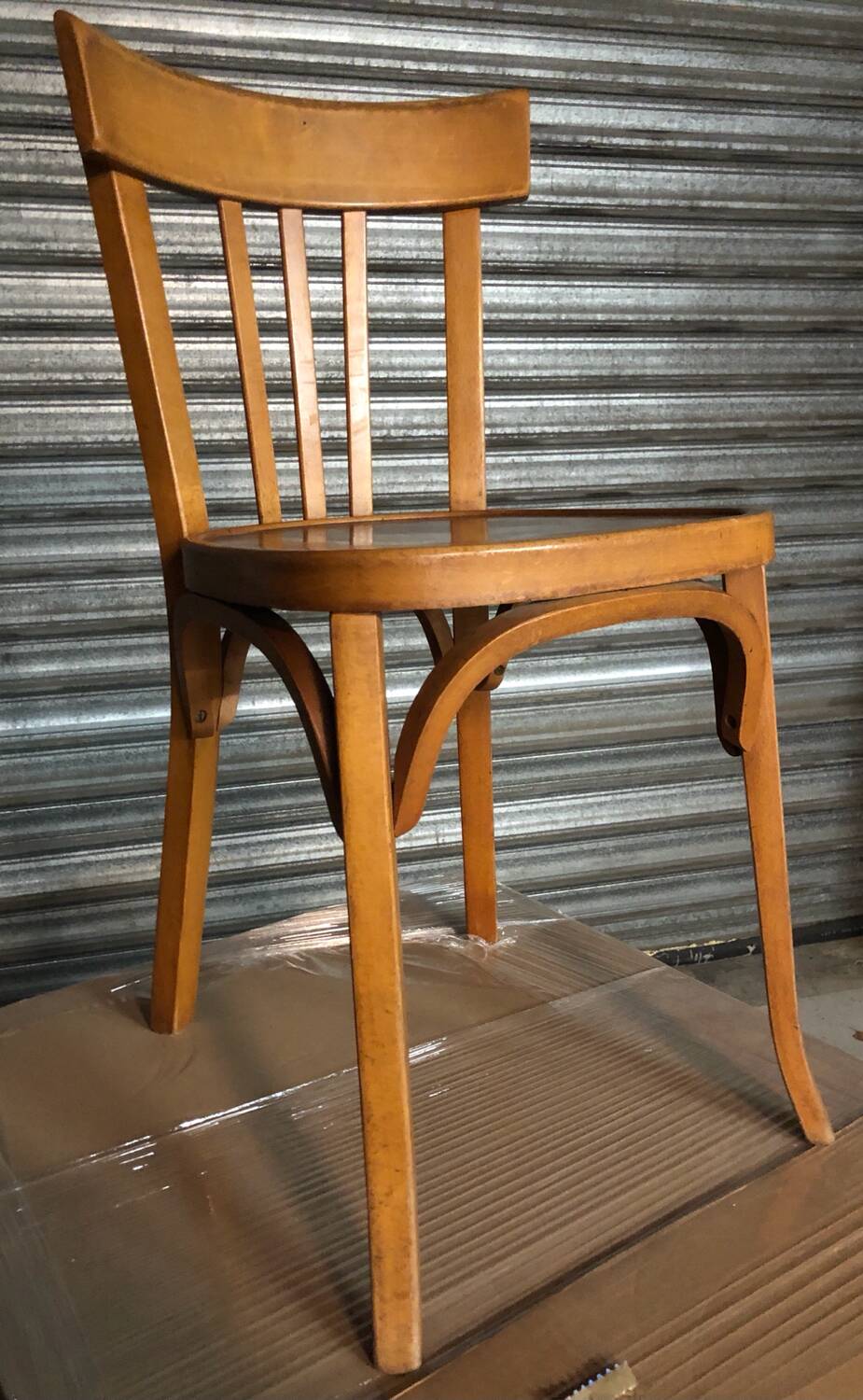 8 antique Baumann bistro chairs