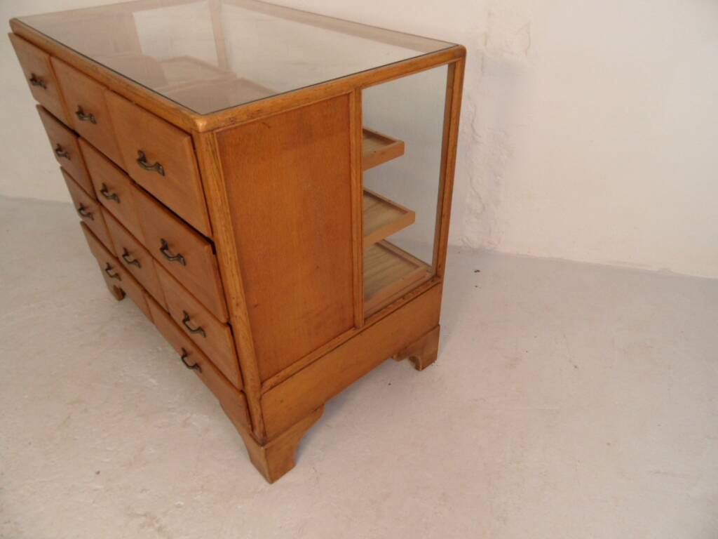 Antique oak store counter with drawers