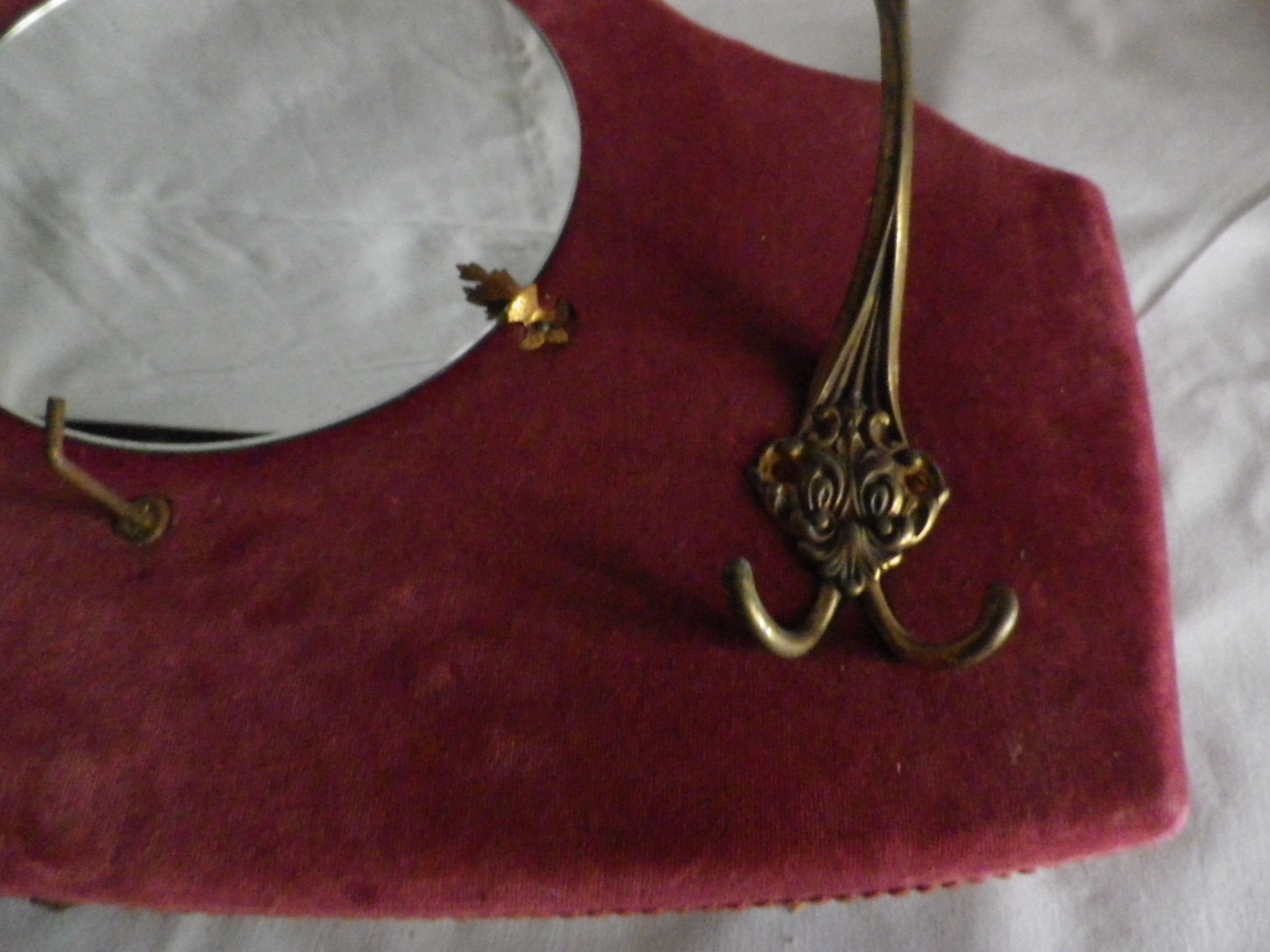 Mirror on red velvet