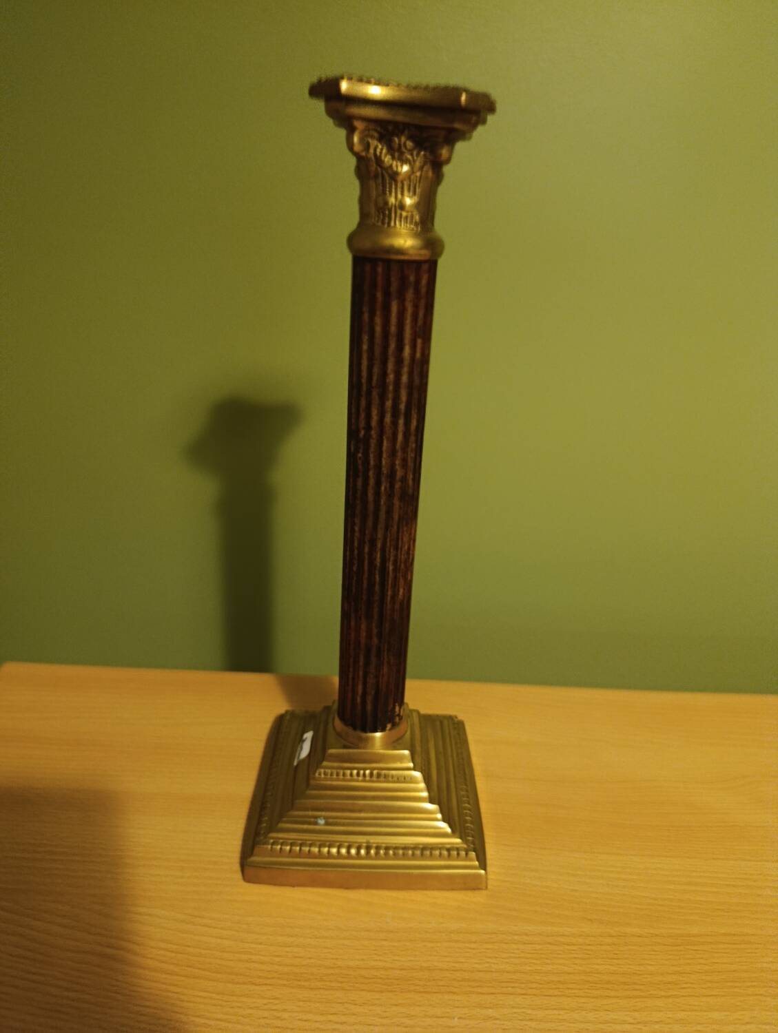 Golden brass candlestick, Corinthian style, vintage