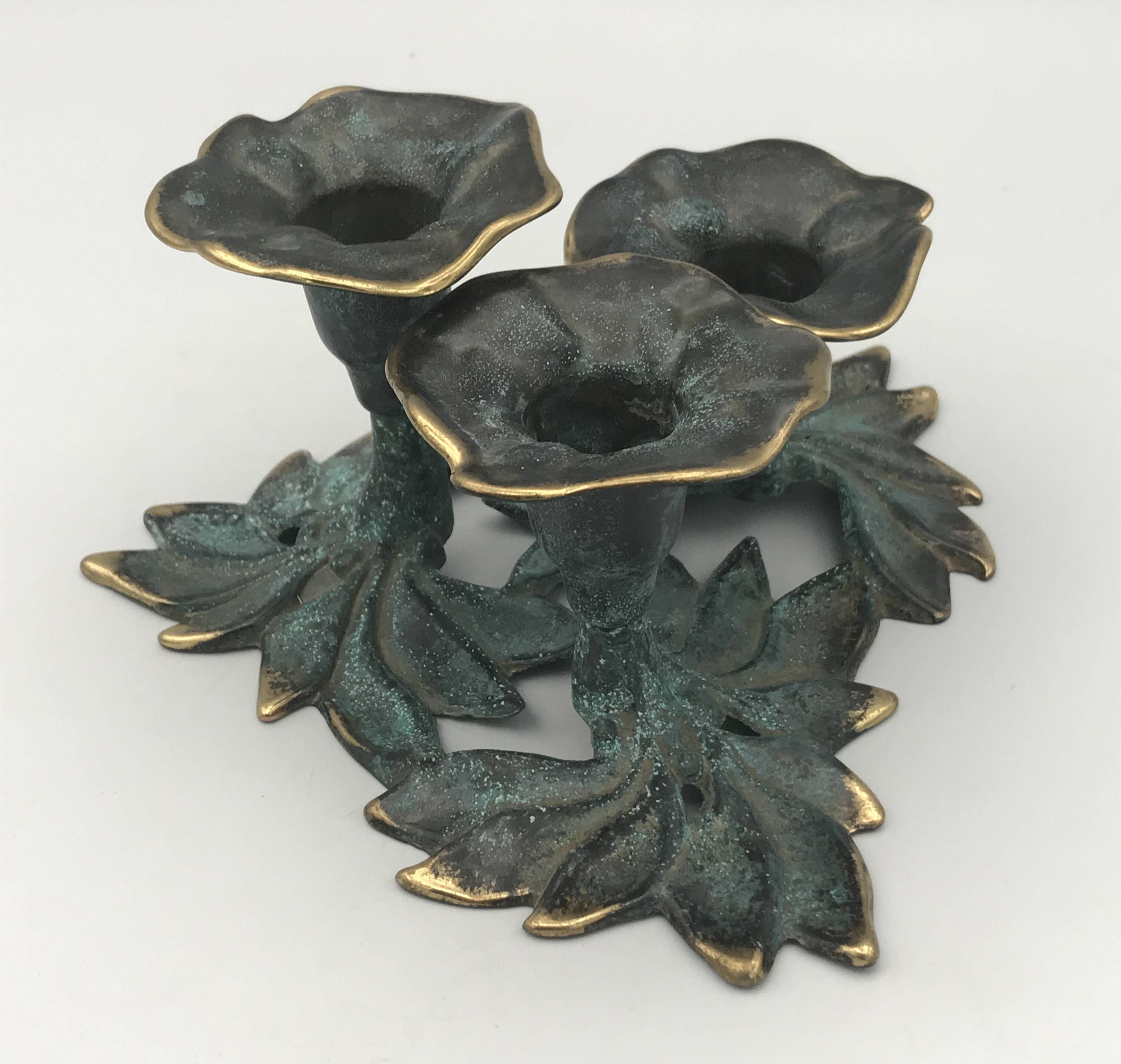 3-flower brass candlestick with green patina