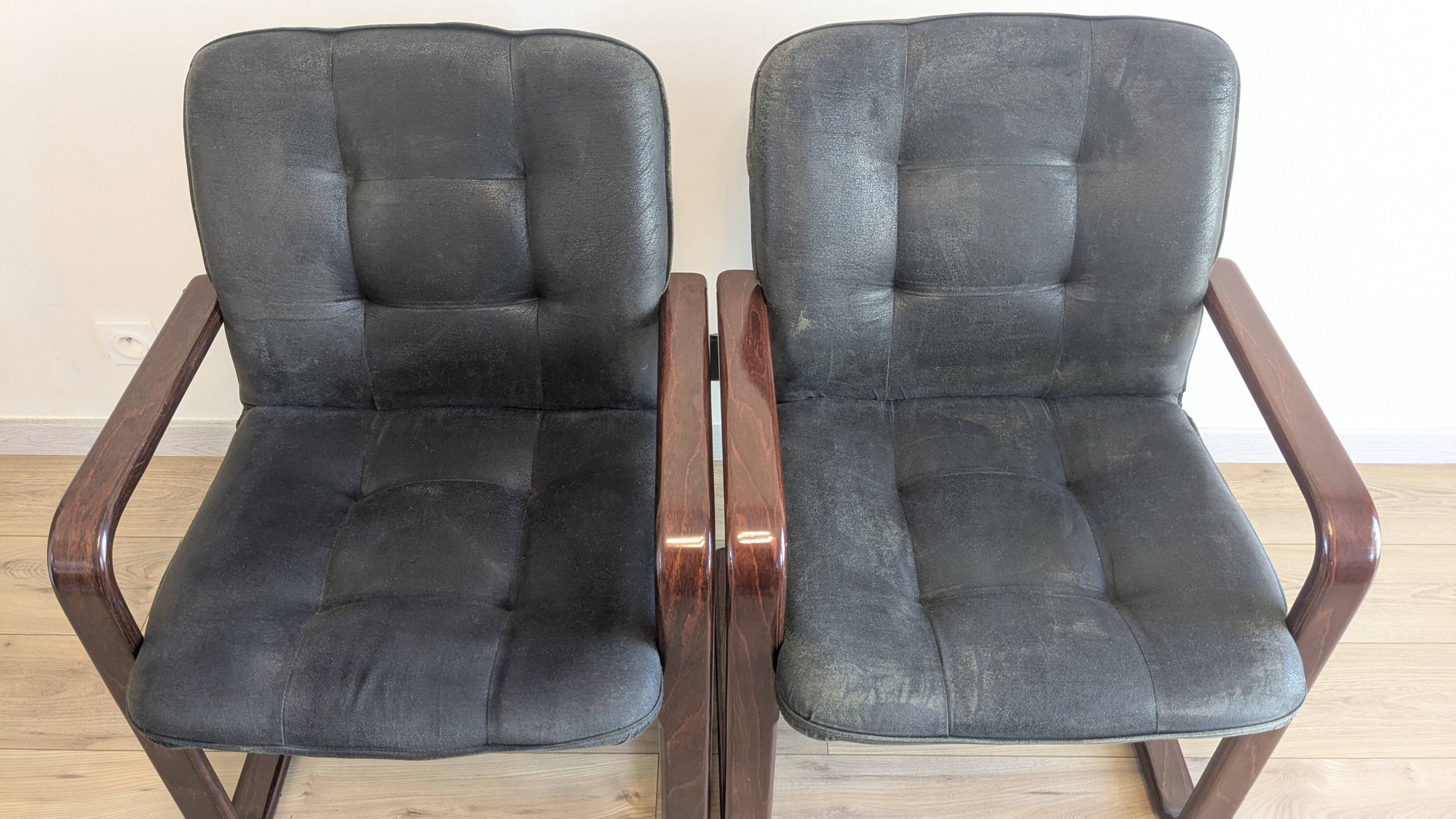 Pair of vintage cantilever armchairs in rosewood veneer.