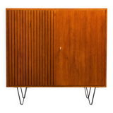 Highboard in teak wood with grooved doors,