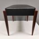Footstool with teak wood legs and black skai (imitation leather) 1970s