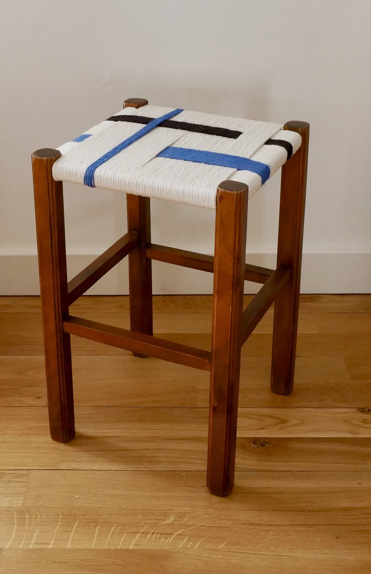 Wooden stool. Vintage stool. woven stool