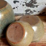 Three nesting pottery salad bowls in glazed stoneware