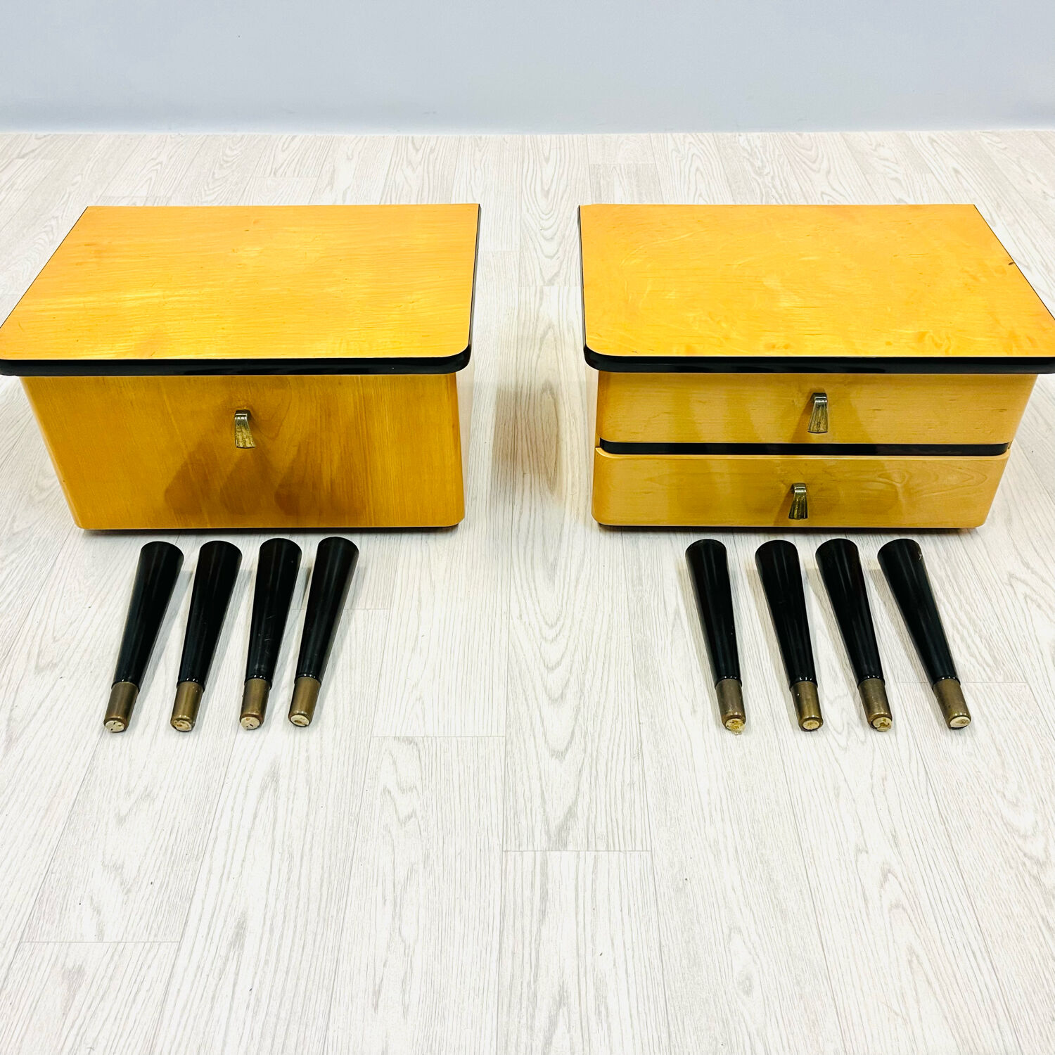 A pair of night cabinets