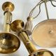 Trio of vintage knotted candlesticks brass