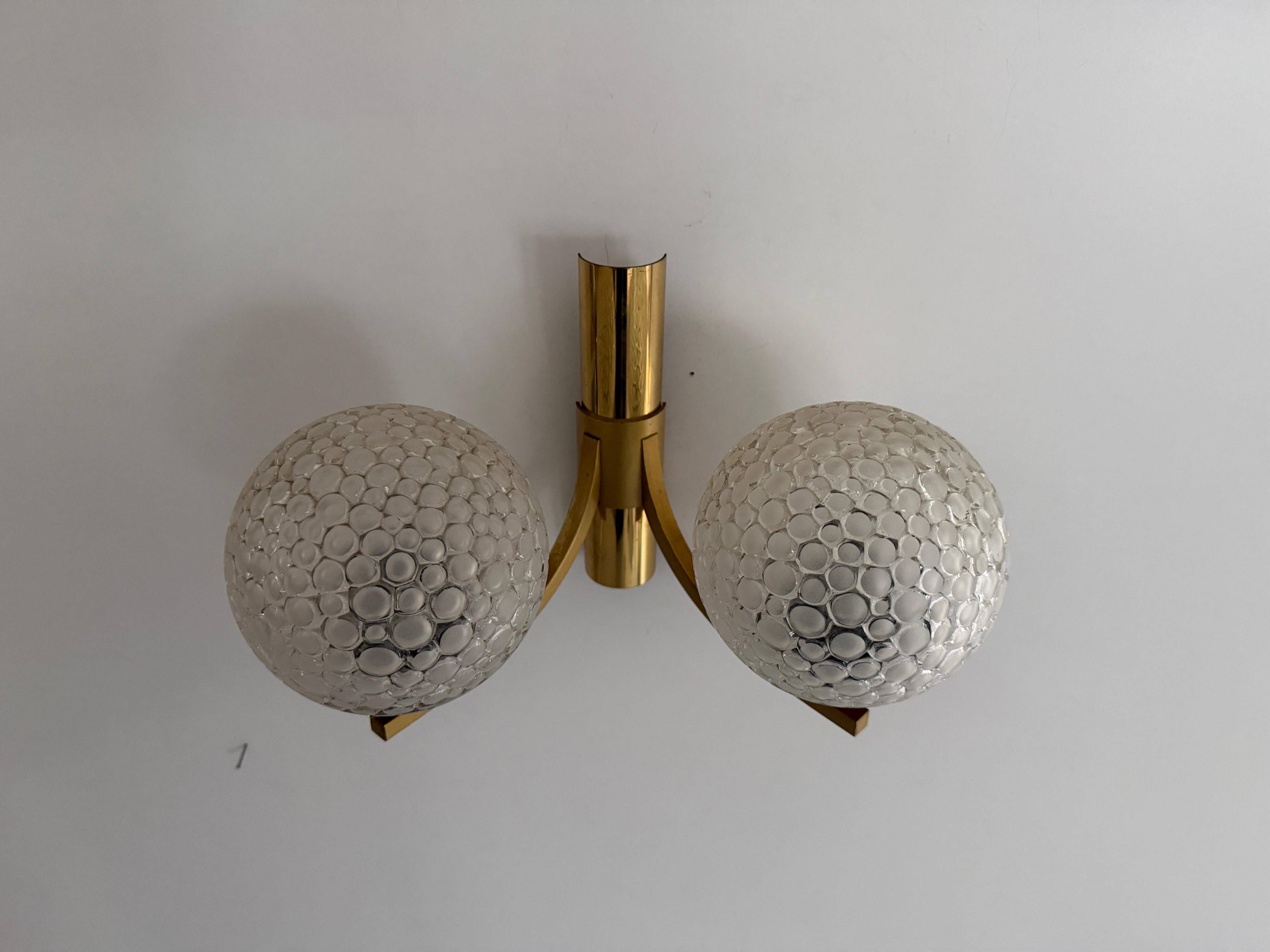Simple two-armed wall light in brass and glass by Ball and Ball, Kaiser, 1960s, Germany.