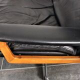Armchair and footstool by André Vandenbeuck for Strässle in black leather