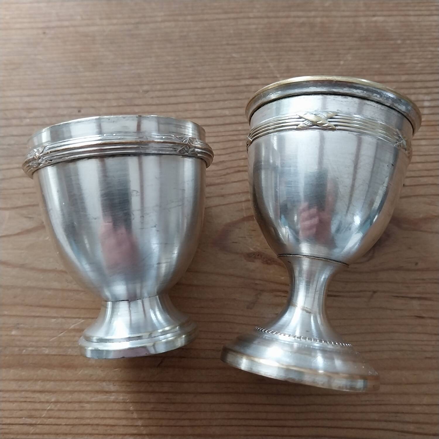 Antique egg cups on silver-plated metal stand