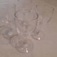 Set of 4 small stemmed glasses for strong alcohol.