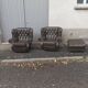 Pair of Chesterfield armchairs with footrest