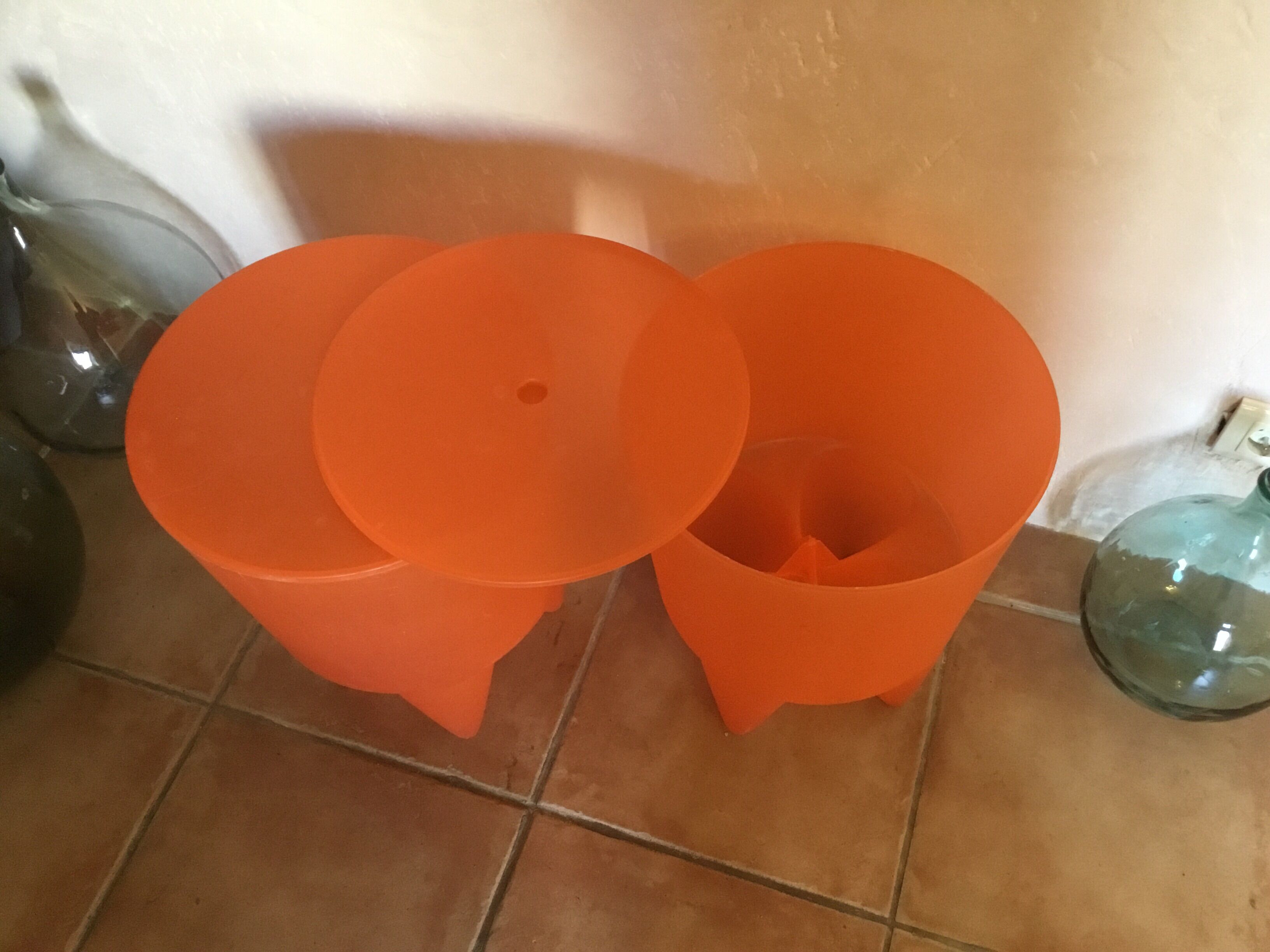 Pair of Bubu 1st orange stools by Philippe Starck