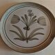 Vintage flat plate in sandstone marked Longchamp