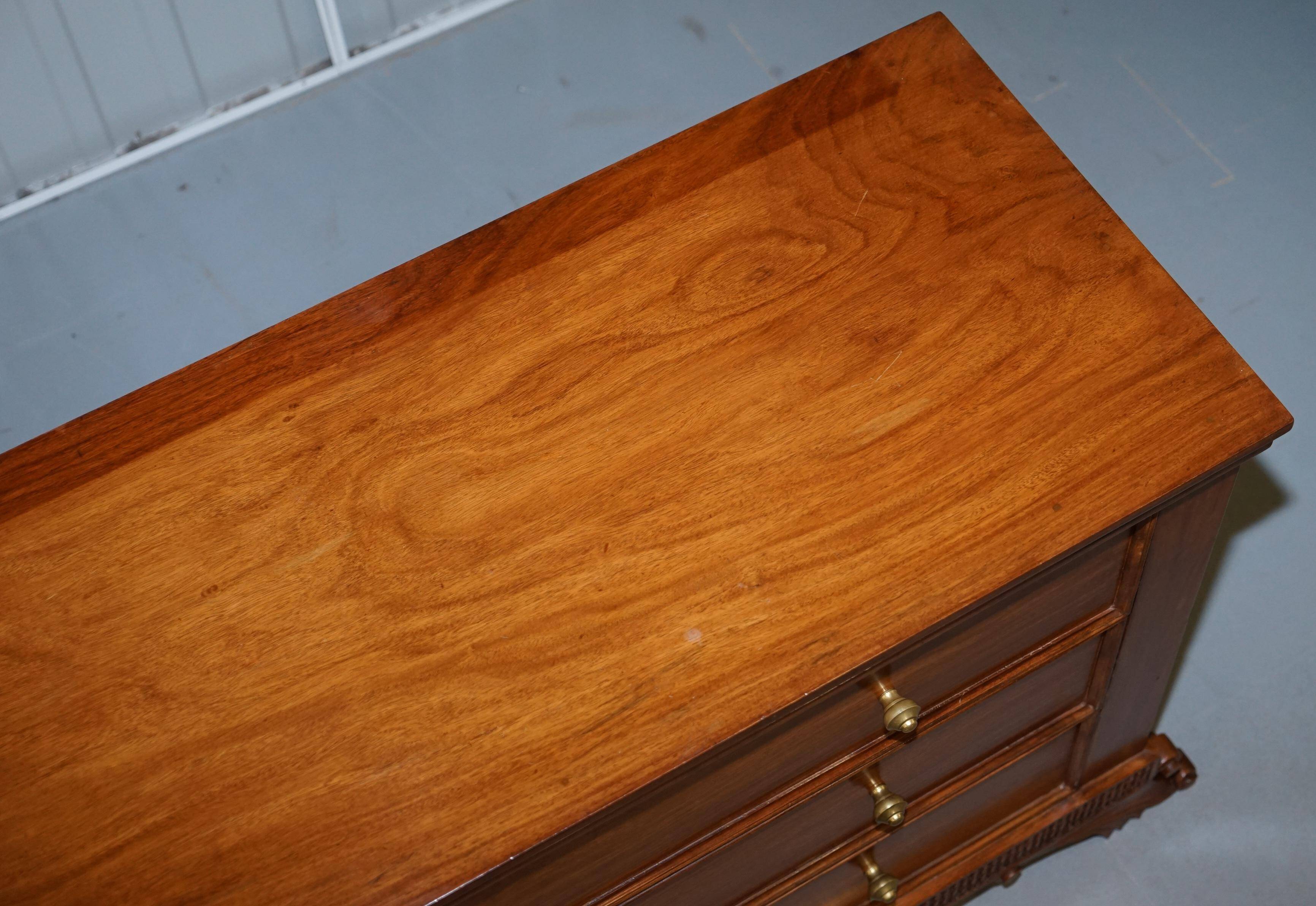 Set of hardwood dressers with finely carved bases.