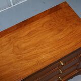 Set of hardwood dressers with finely carved bases.