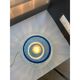 Light blue Murano-style glass with a balloton lamp.