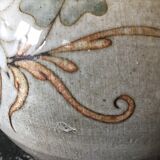 Glazed stoneware ball vase decorated with flowers