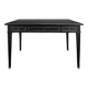 Large flat desk in Louis XVI style, black lacquered with gold highlights.