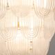 Lustre en verre de Murano blanc translucide. Italie, travail contemporain.