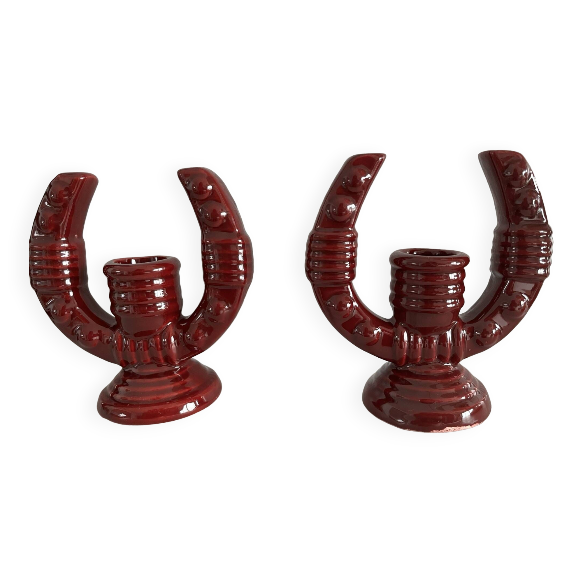 2 fifties red ceramic candle holders, horseshoe pattern