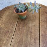 Round table at 2 vintage wood rabats
