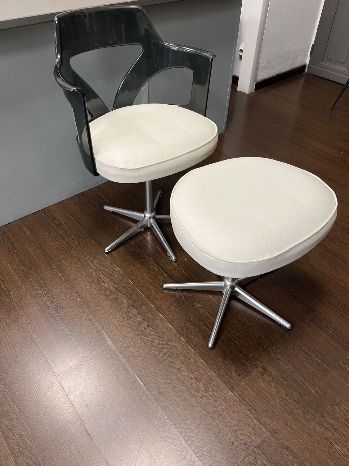 Old hairdressing chair and its footrest