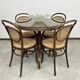 Thonet dining table for 4 people with a glass top.