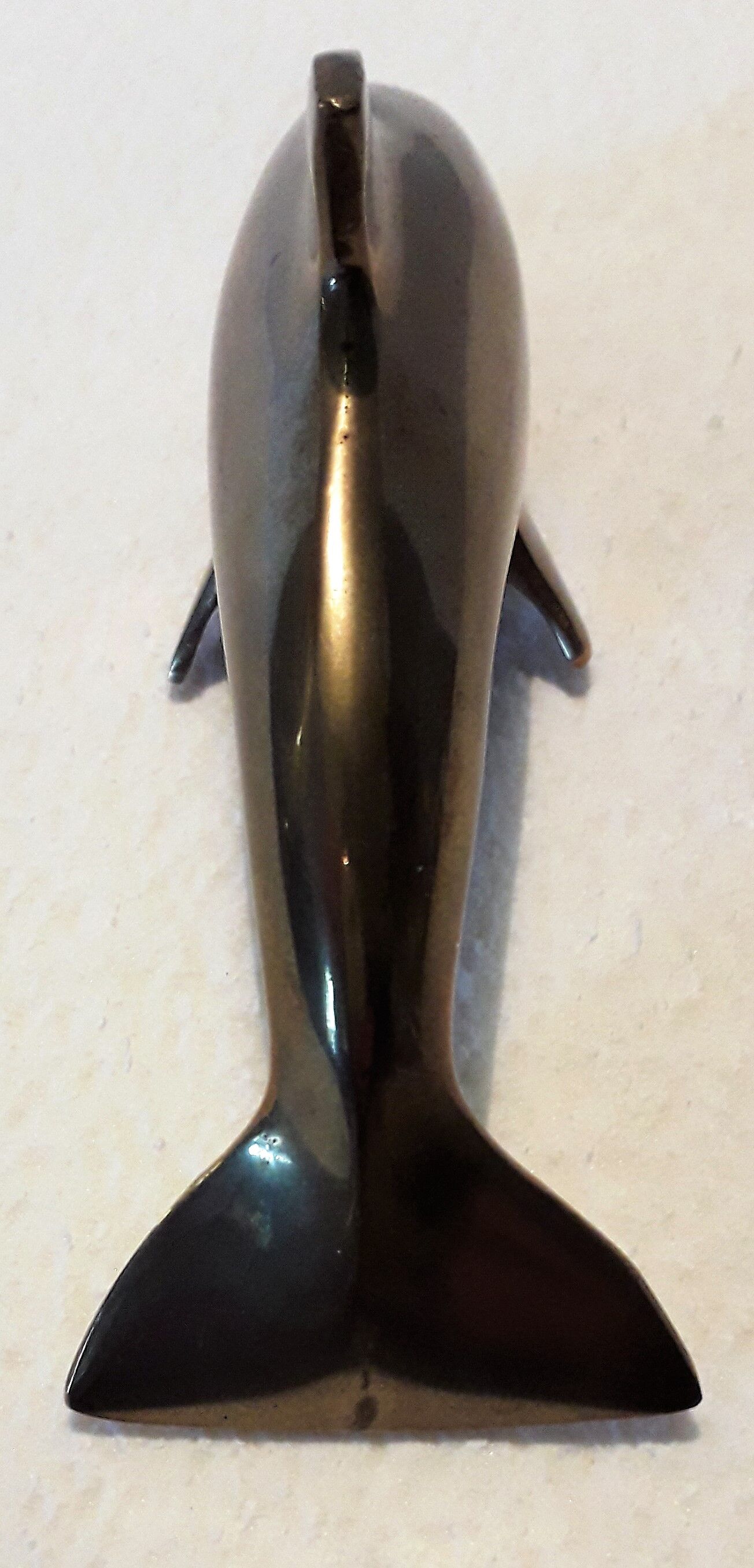 Brass dolphin