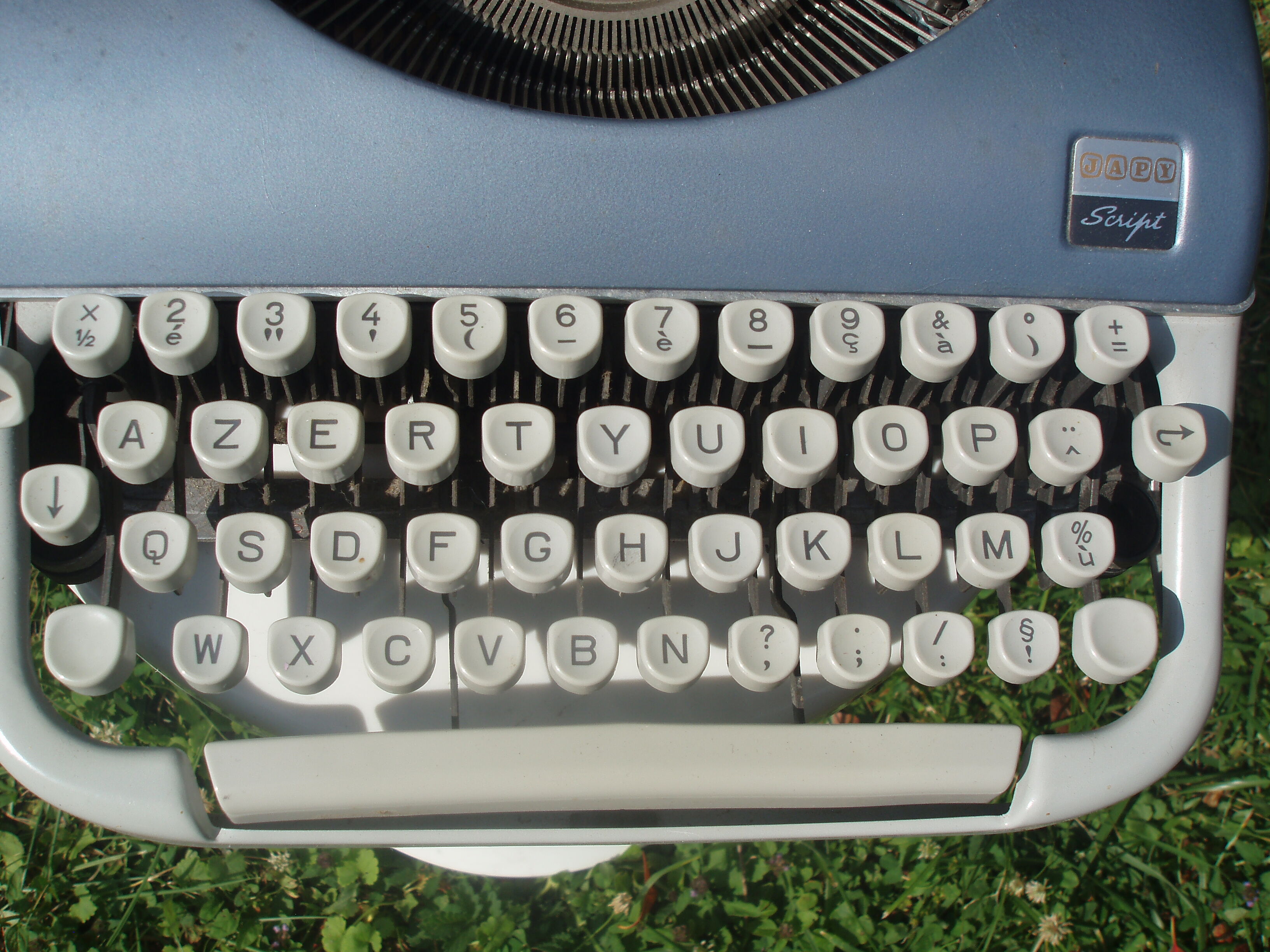 Typewriter blue japy script  with manual and carrying case