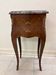 Commode. With a marble top.