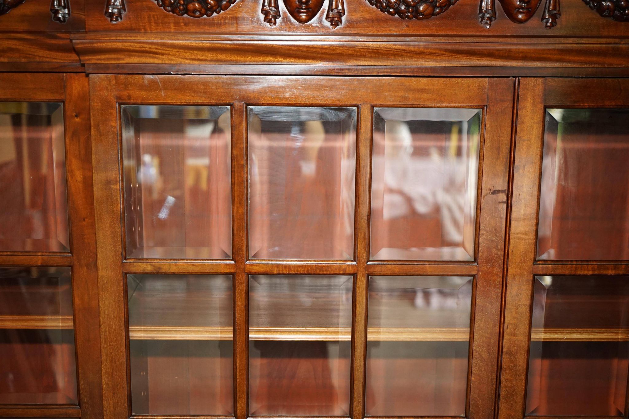 Monumental glass library in Victorian hardwood.