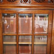 Monumental glass library in Victorian hardwood.