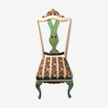 Chair with lyre backrest