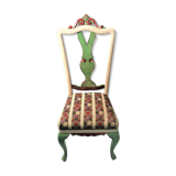 Chair with lyre backrest