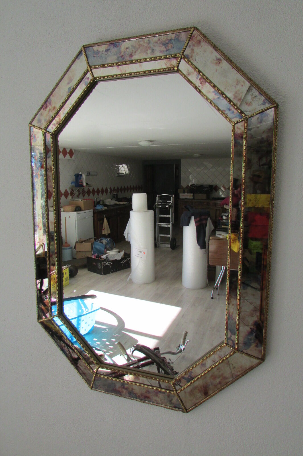 Miroir octogonal à parecloses,églomisé