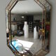 Miroir octogonal à parecloses,églomisé