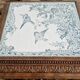 Antique musical trivet made of carved wood and Belle Époque earthenware.