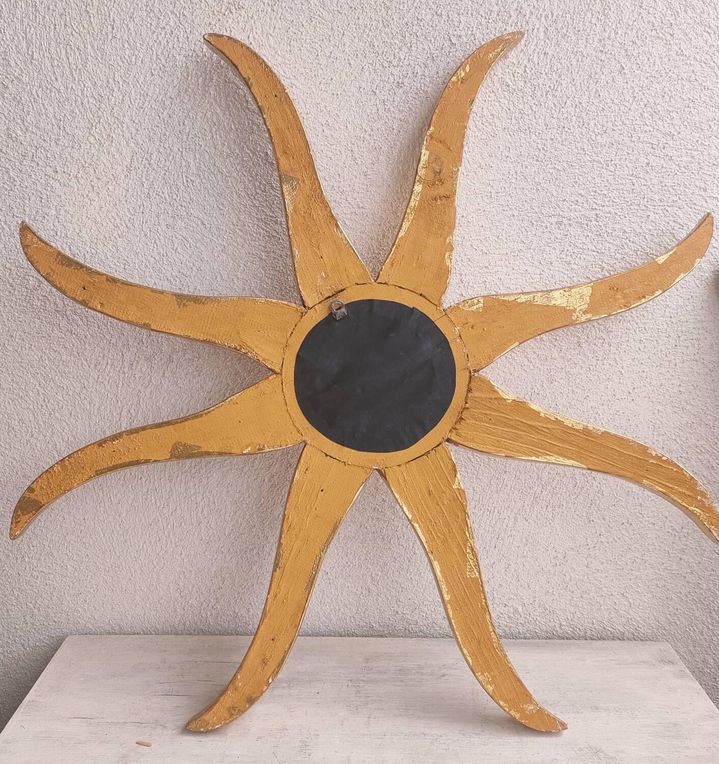 Ethnic sun mirror