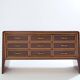 Commode de Paolo Buffa en palissandre sycomore et laiton vers 1940