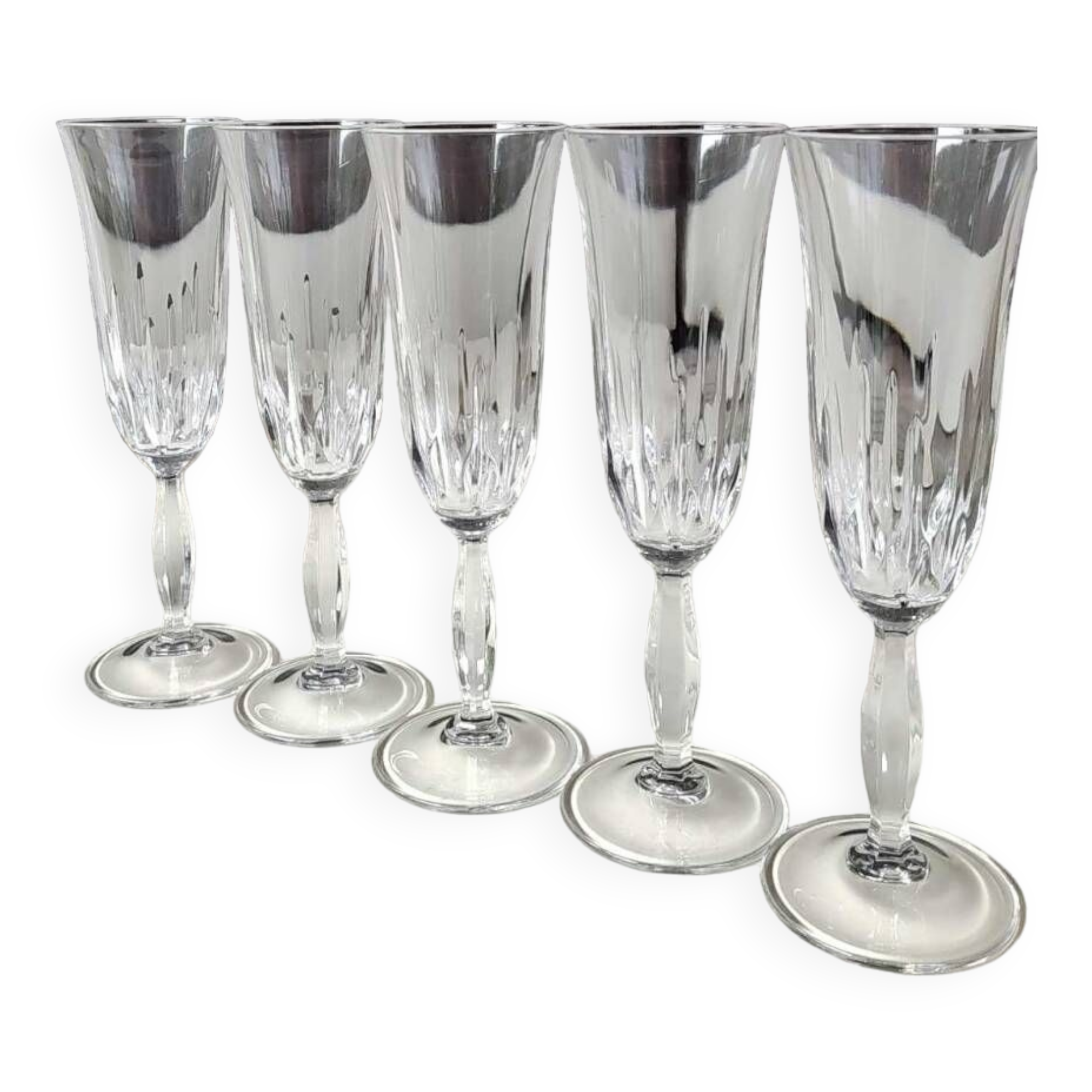 Lot 5 Large champagne flutes in cut crystal. Diamond drop/point patterns. High 20.5 cm
