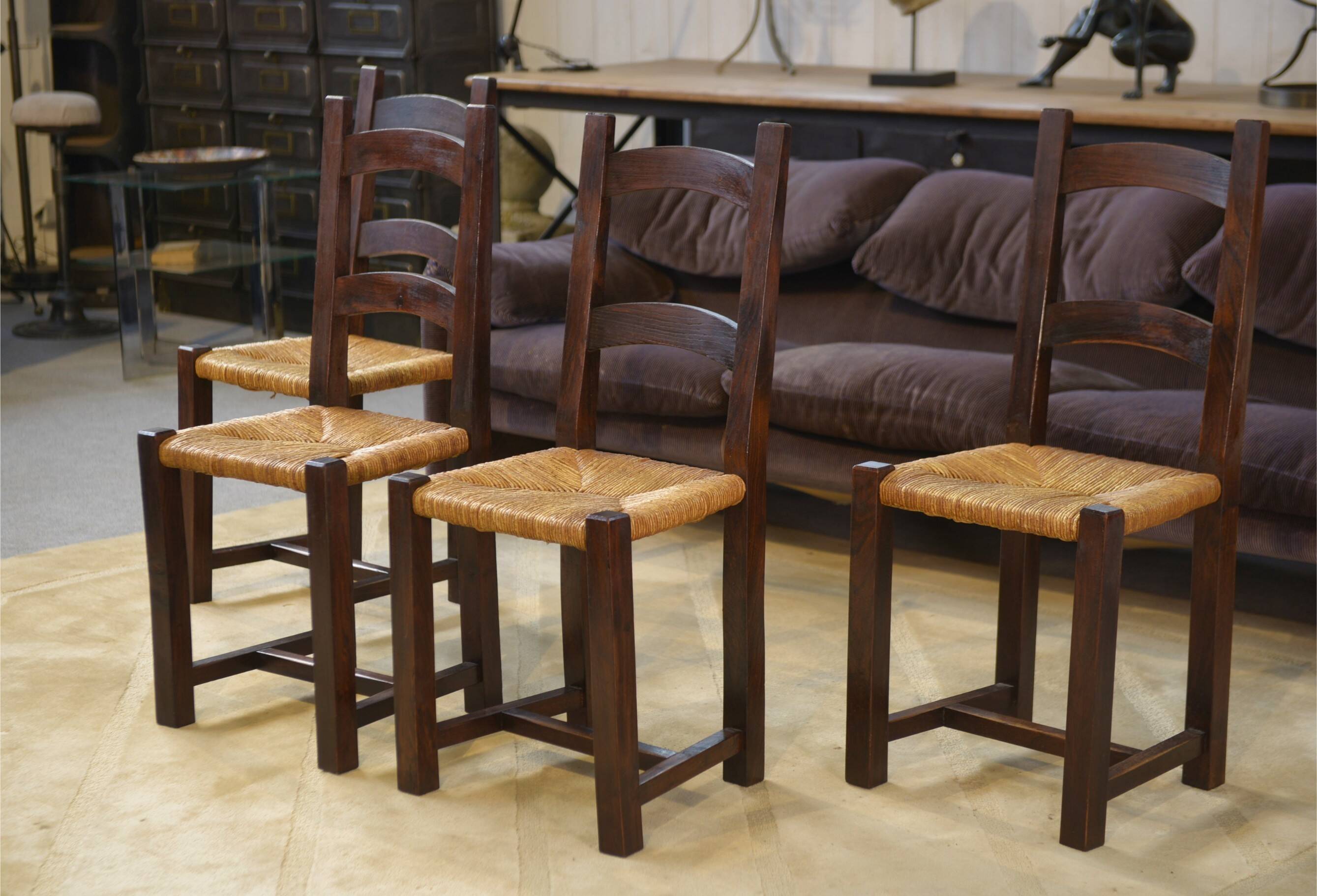 Set of 4 chairs in elm and straw by Aranjou 1950s