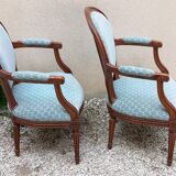 Paire de fauteuils médaillon style Louis XVI