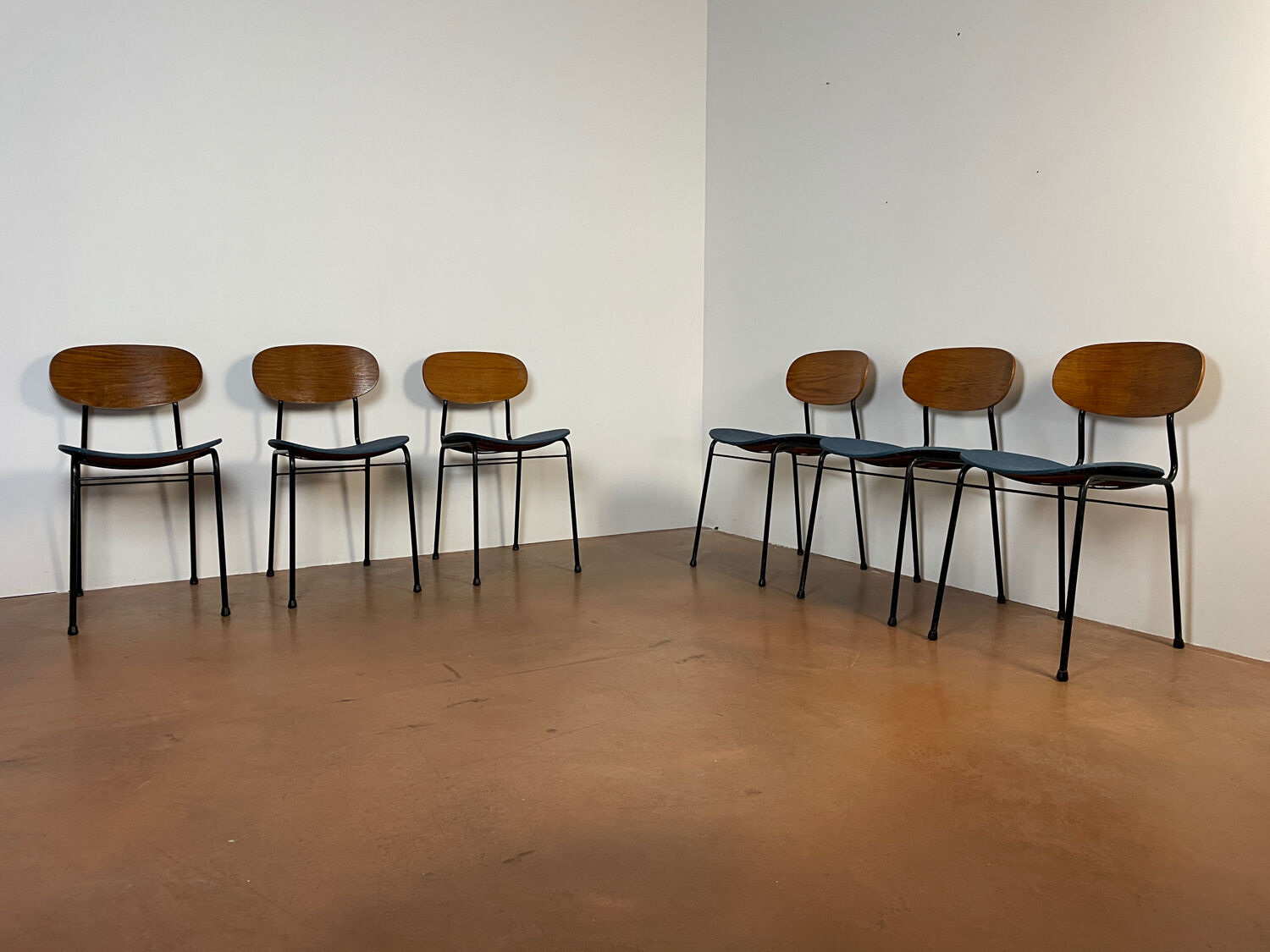 Wooden chairs and skaï