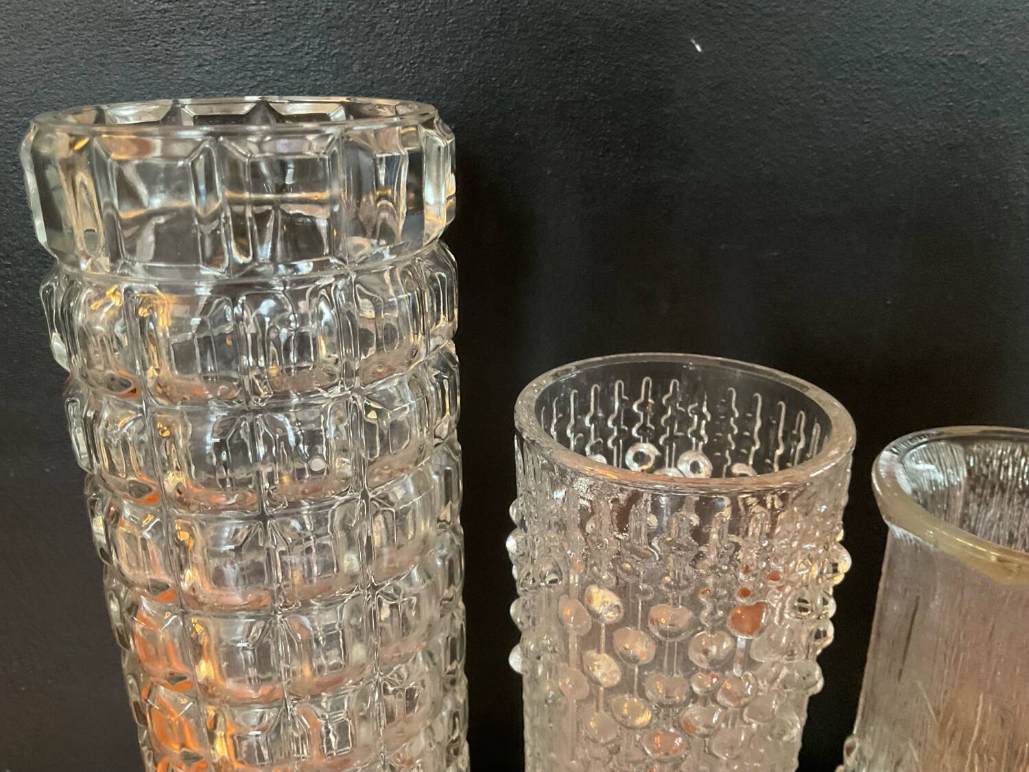 Vintage trio of moulded glass roll vases