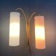 Brass wall lamp with a pink and a blue glass shade 1960s