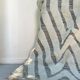 Large hand-knotted beige and cream Berber rug, 2.90m x 1.80m.