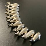 11 whale-shaped metal knife holders