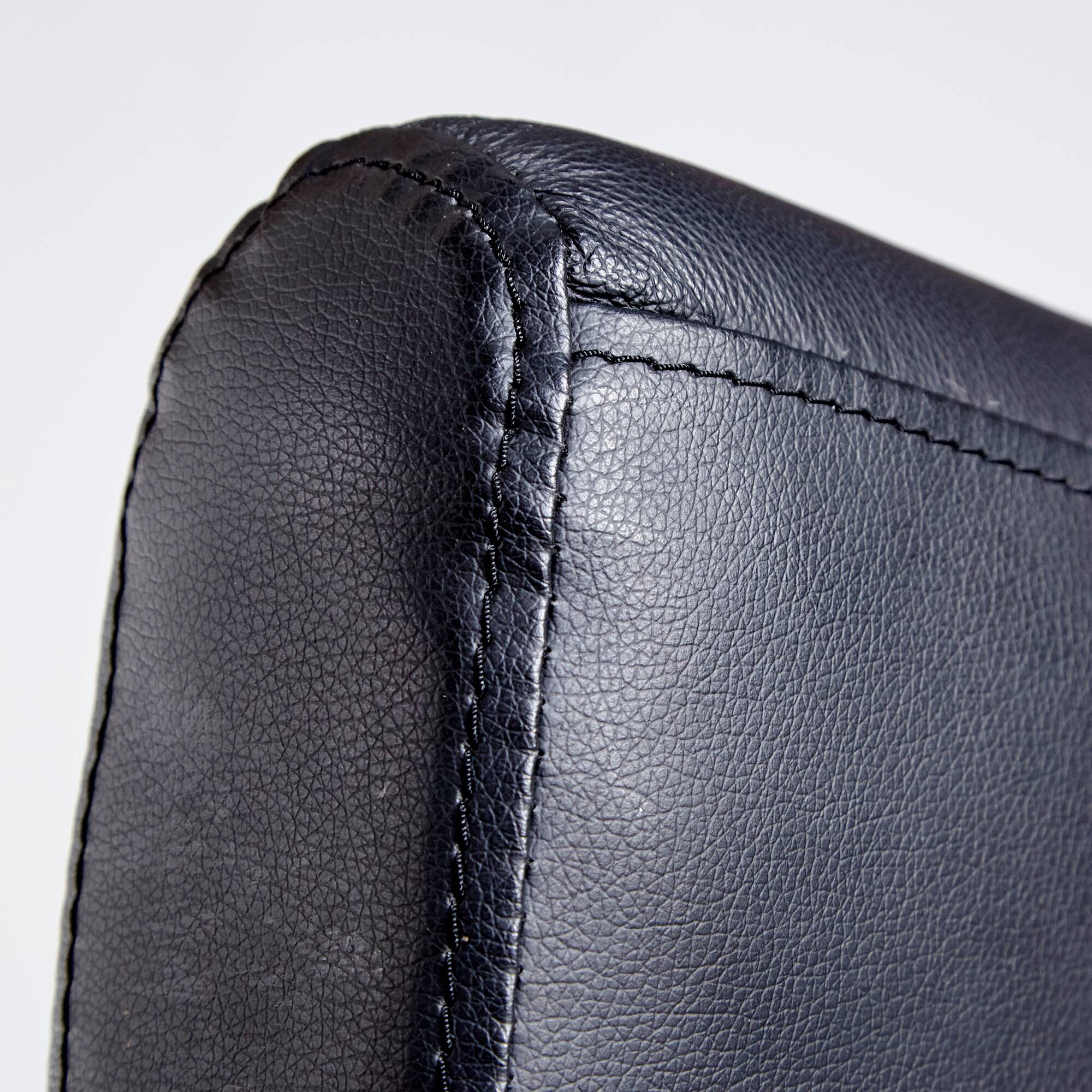 Steel armchair with leather upholstery